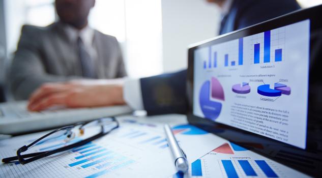 Team planning digital marketing strategies with sticky notes on whiteboard.